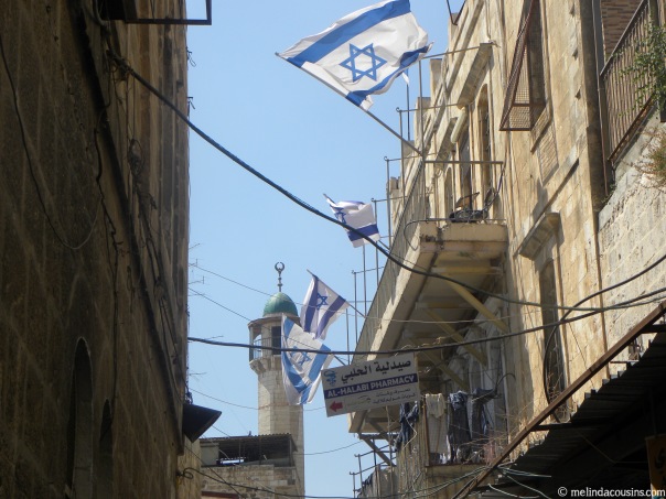 Mosque and Israeli flags